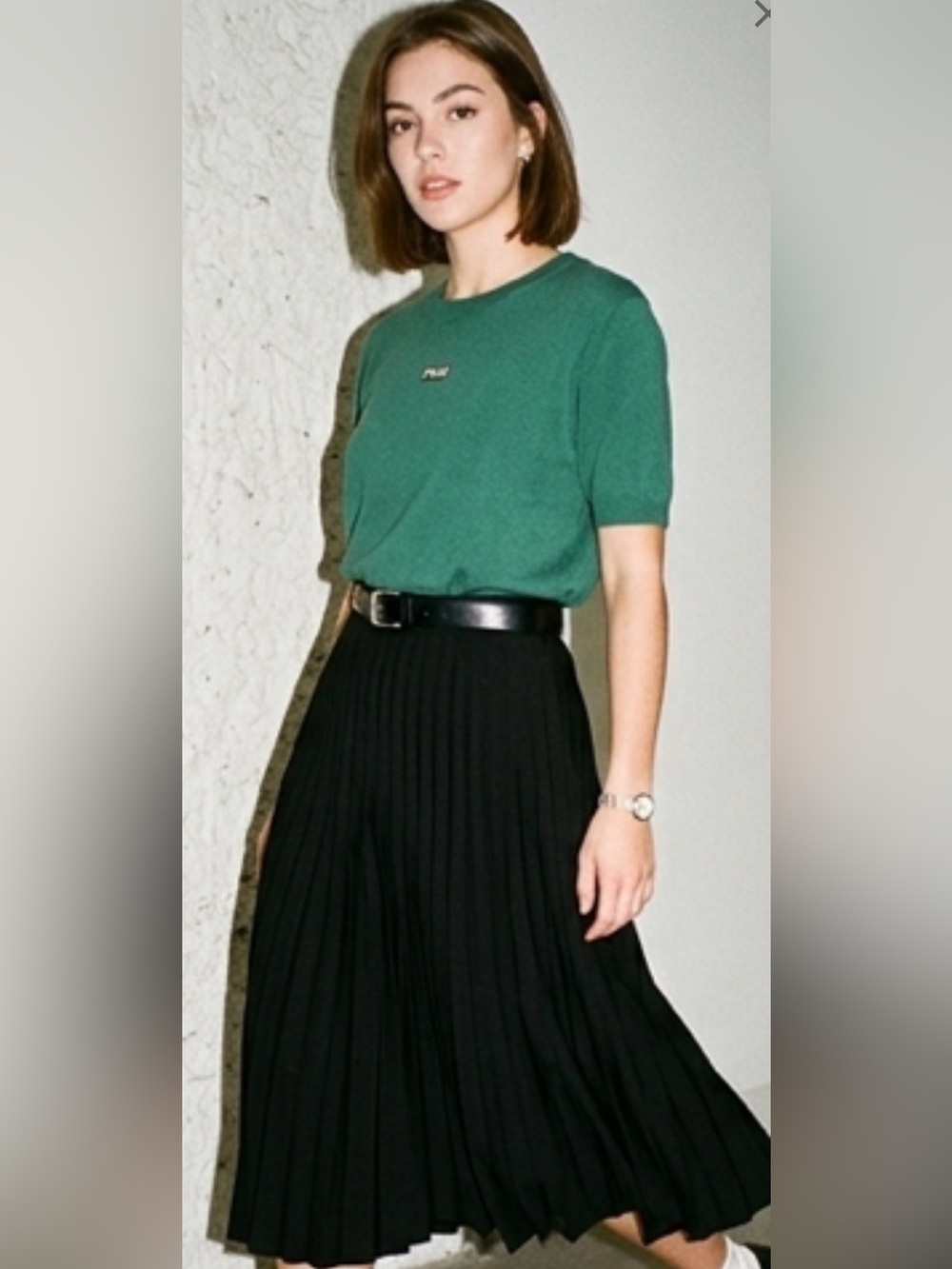 Short-sleeve, fine-gauge knit crewneck top in a kelly green shade.